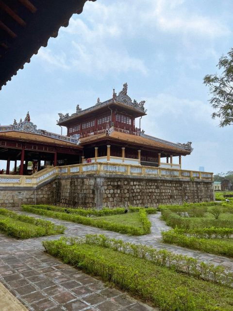 Hue: Hue Walking Tour to Imperial Citadel With Tour Guide - Admiring the Architectural Relic: The Flag Tower
