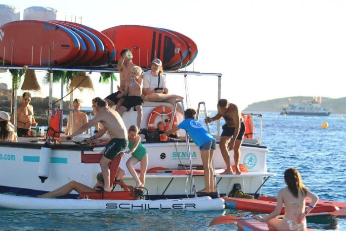 Ibiza by Sea: Coves, Caves, Water Sports & Open Bar - Getting to the Meeting Point