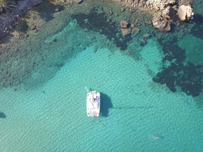 IBIZA: CATAMARAN CUEVAS CALA BASSA AND PLAYA CALA CONTE SUP PADDLE&SNORKEL - Introducing the Ibiza Catamaran Tour: A Balance of Adventure and Relaxation