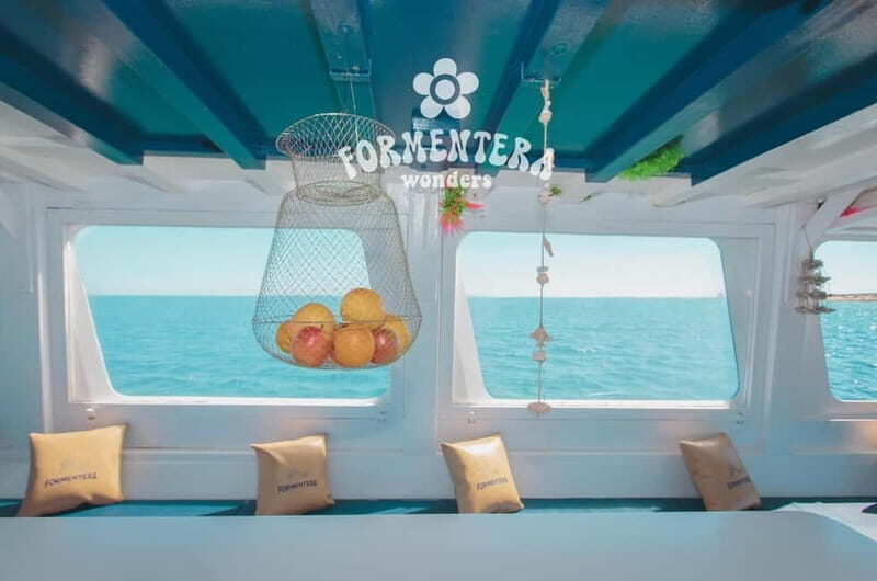 Ibiza: Formentera Cruise with Paella, OpenBar & Water Sports - Guides, Atmosphere, and Extras