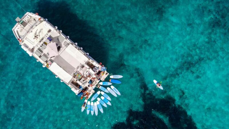 Ibiza: Formentera Trip w/ Paella, BBQ, Open Bar, Sports & DJ - The Sum Up