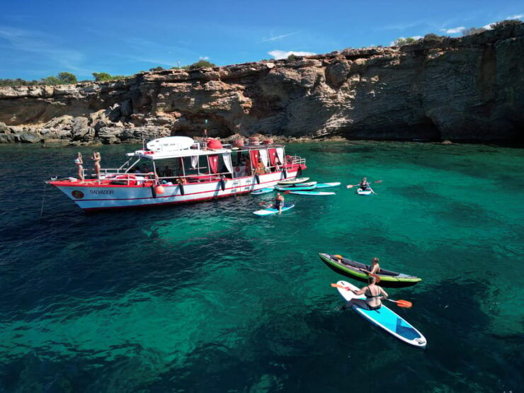 Ibiza: Secret Coves Guided Boat Tour With Open Bar and Tapas - Explore Stunning Coves