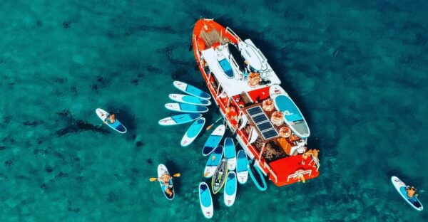 Ibiza: Secret Coves Guided Boat Tour With Open Bar and Tapas - Booking and Cancellation