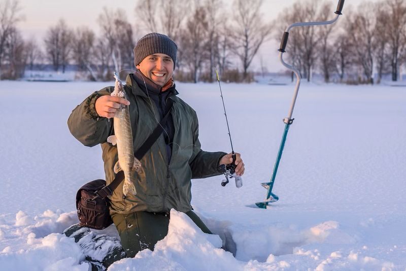 Ice Fishing Lapland Experience from Rovaniemi - A fishing trip with a campfire at its heart
