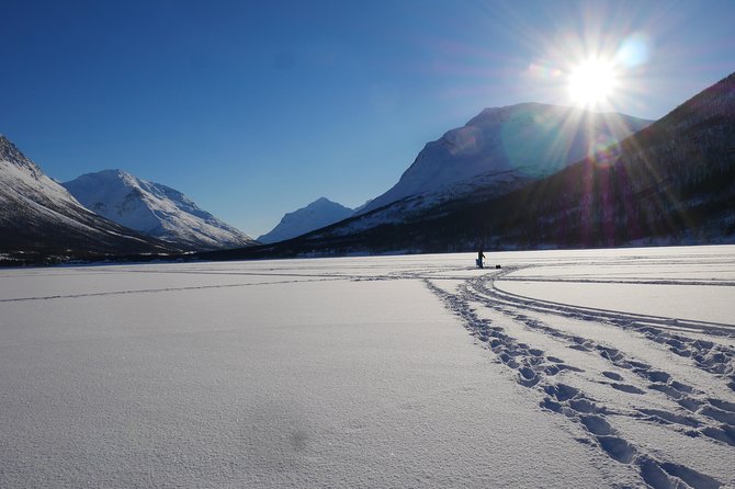 Ice Fishing On The Fjord - Norwegian Traditions and Arctic Wilderness Experience