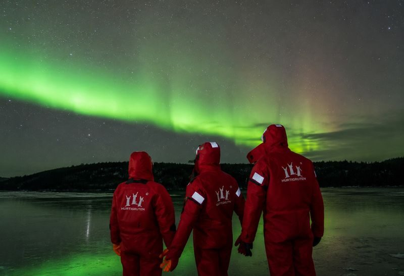 Ice Floating and Aurora Borealis Tour - Getting into the floating suit