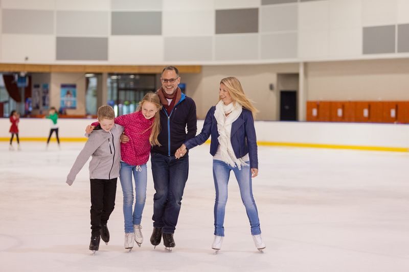 Ice Skating Experience at OBrien Icehouse Melbourne - A public skate with a sporting backdrop