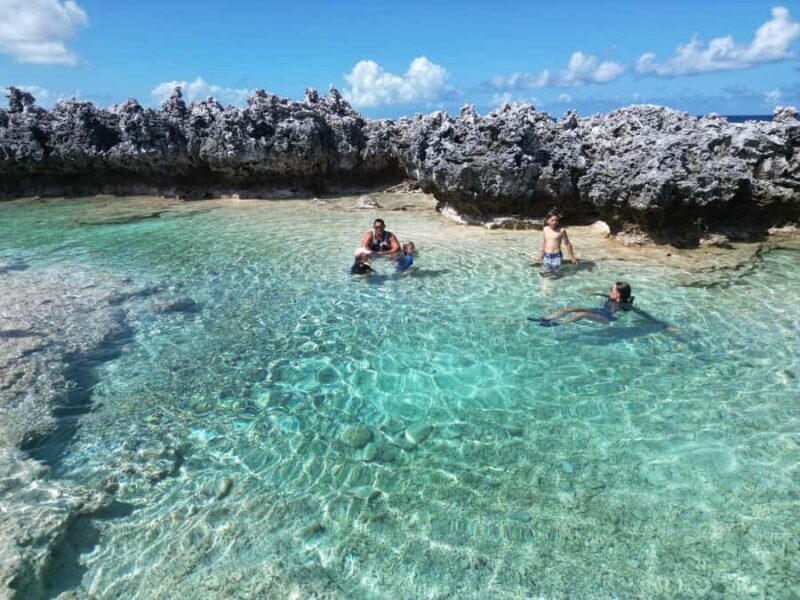 Île aux Récifs and its Natural Pools, Passe de Tiputa, and Aquarium - Lunch on a Private Motu and Cultural Experiences