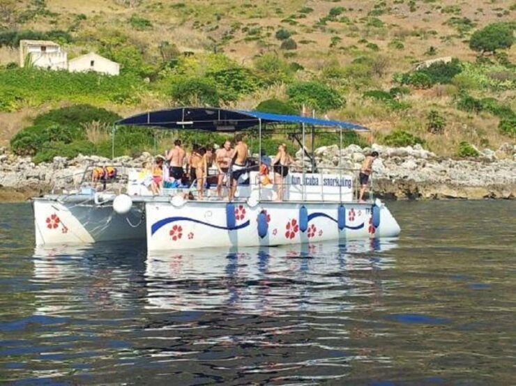 In Catamaran to Reserve Zingaro and Faraglioni Scopello - Pricing and Duration