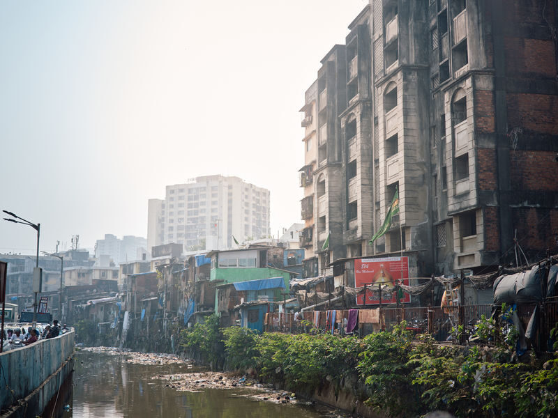 Inside Dharavi: A Unique Slum Tour with an Local Guide - A walk through work, homes and narrow lanes