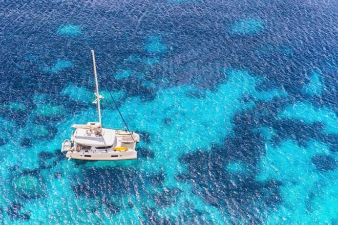Isla Mujeres: Catamaran, Snorkeling, Open Bar and Buffet - Relax at a Beach Club