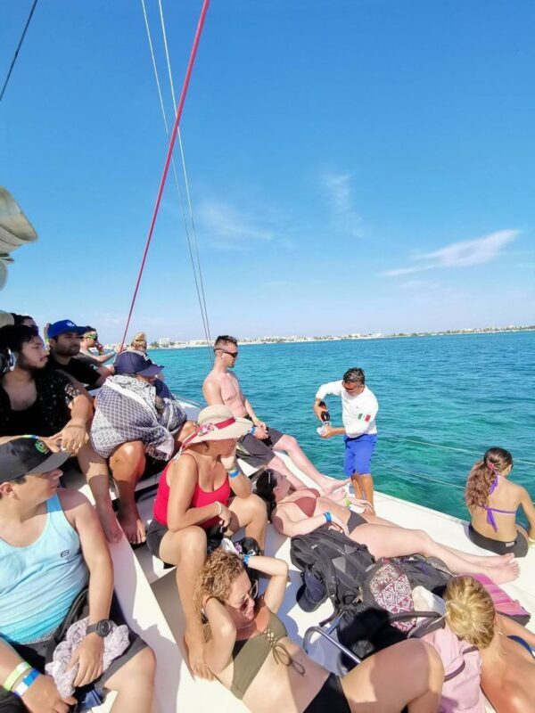 Isla Mujeres Catamaran tour with Open Bar & Buffet Lunch - The reef stop is a bonus, not the main event