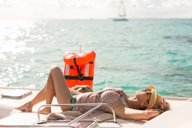 Isla Mujeres Catamaran Tour With Snorkel, Open Bar and Transportation From Hotel - Snorkeling and Catamaran Experience