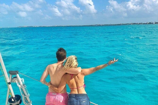 Isla Mujeres Catamaran Tour With Snorkel, Open Bar and Transportation From Hotel - Pickup and Meeting Point