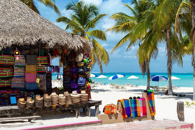 Isla Mujeres Catamaran Tour With Snorkel, Open Bar and Transportation From Hotel - Weather-related Cancellations