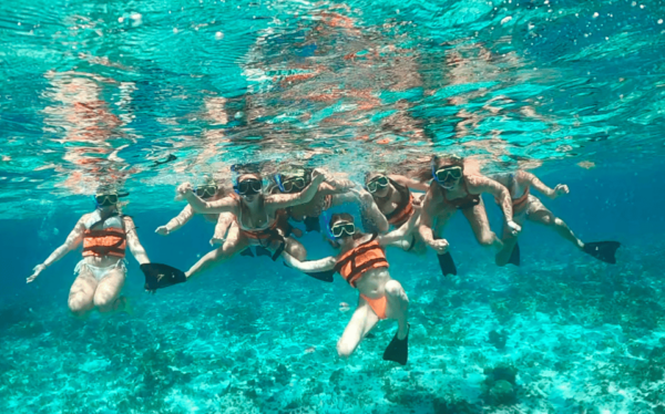 Isla Mujeres Catamaran Tour With Snorkeling & Open Bar - Buffet-style Typical Cuisine
