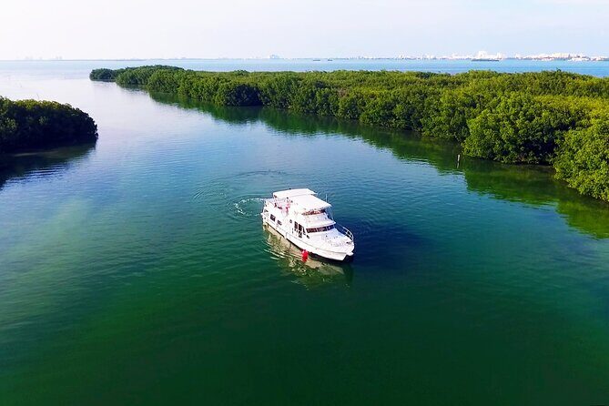 Isla Mujeres Full Day Tour on Yacht with Snorkel and Buffet - Sunset and Return: The Perfect End to a Day