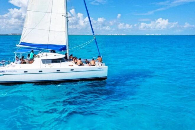 Isla Mujeres: Half Day Private Catamaran With Snorkeling - Booking and Cancellation Policy