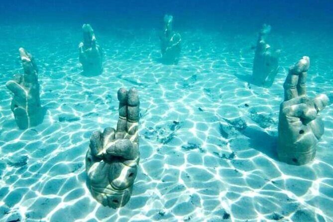 Isla Mujeres on luxury catamaran with snorkel, open bar and lunch - FAQ