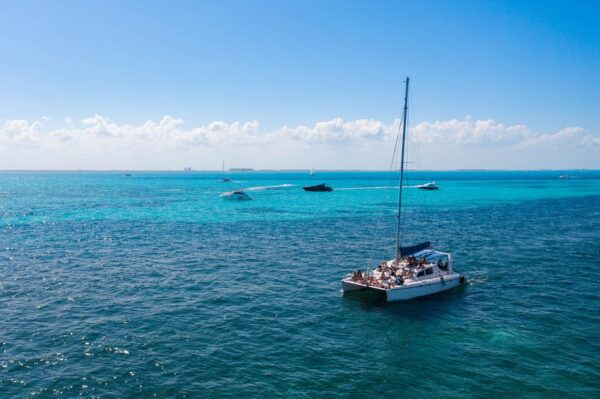 Isla Mujeres, Snorkeling, and Catamaran Party Cruise - Snorkeling at Arrecife El Meco