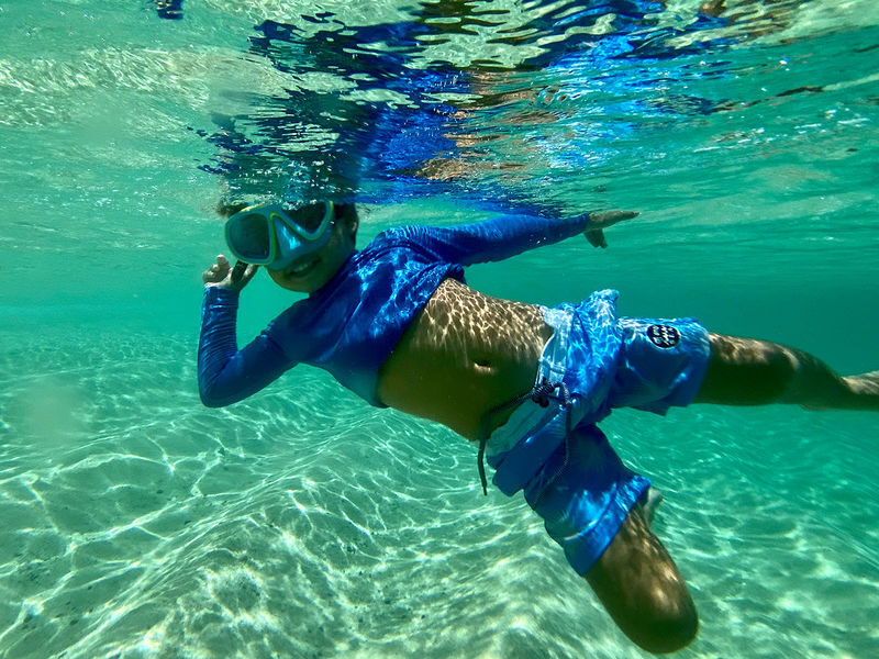 Island Tour + Waterfall & Snorkel - Reading the famous surf coast