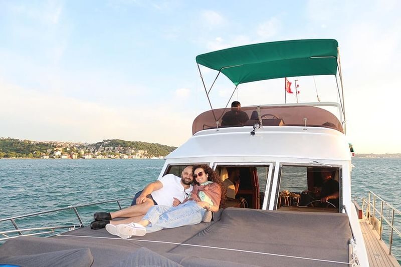 Istanbul: Bosphorus Sunset Yacht with Tour Guide and Snacks - Snacks, tea, and the onboard feel