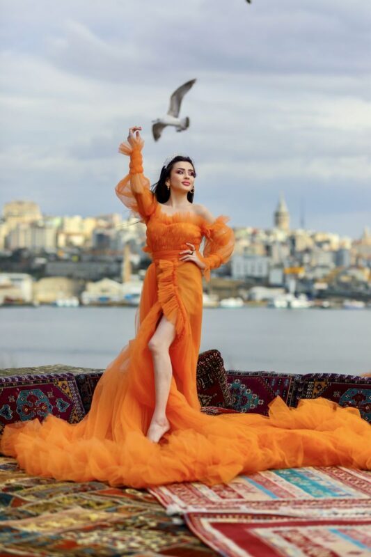 Istanbul: Private Outdoor Terrace Photo Shooting - A rooftop portrait with Istanbul in the frame
