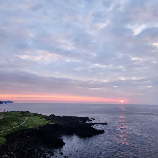 Jeju Island: Sunrise Guided Tour with Hotel Pickup - The Sum Up