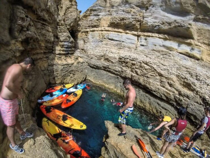 Kayak Route Cala Blanca, in Dins, Sardinera, Portixol Island - Pricing and Reservation