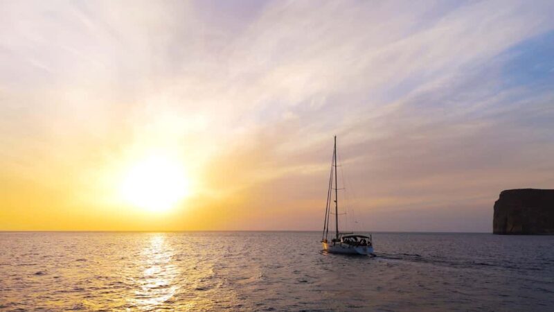 Kissamos: Balos Lagoon Sunset Cruise with Swimming & Snacks - Arriving at Balos Lagoon: Swimming and Exploration