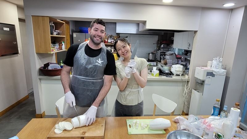 Korean Radish Kimchi (Kkakdugi) Cooking Class in Busan - Making kkakdugi, one practical step at a time