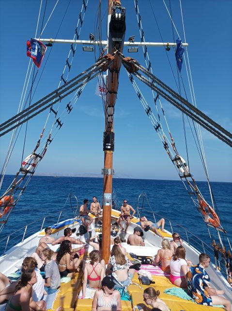 Kos: 3-Island Cruise With Lunch and Hotel Transfer - Language Options and Locations