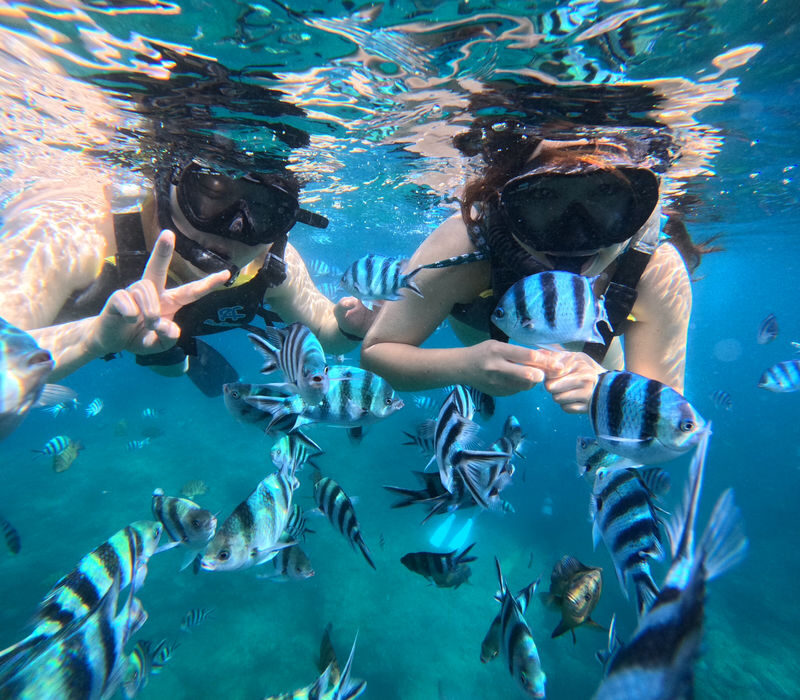 KR support: Okinawa Blue Cave Boat Snorkeling All-in-One experience - Inside the cave, and what happens if the sea turns