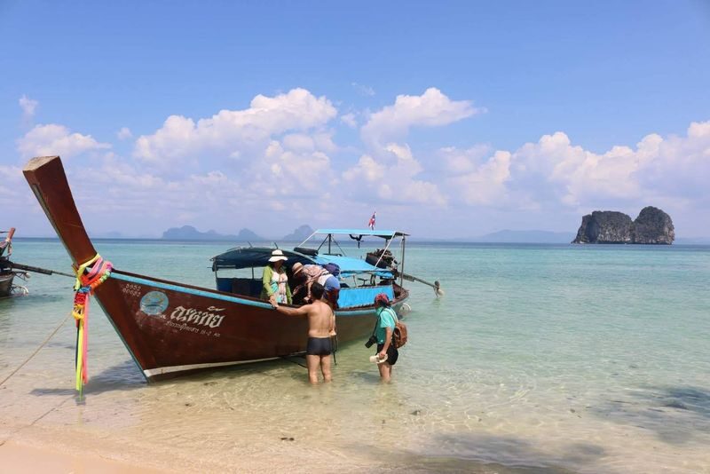 Krabi 4 Islands Half-Day Big Group Longtail Boat Tour - Koh Mook: swimming through Emerald Cave