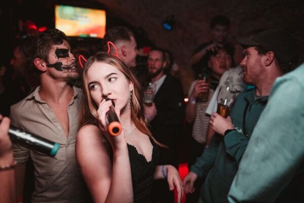 Krakow: Pub Crawl With 1 Hour of Unlimited Alcoholic Drinks - Fun Atmosphere and Activities