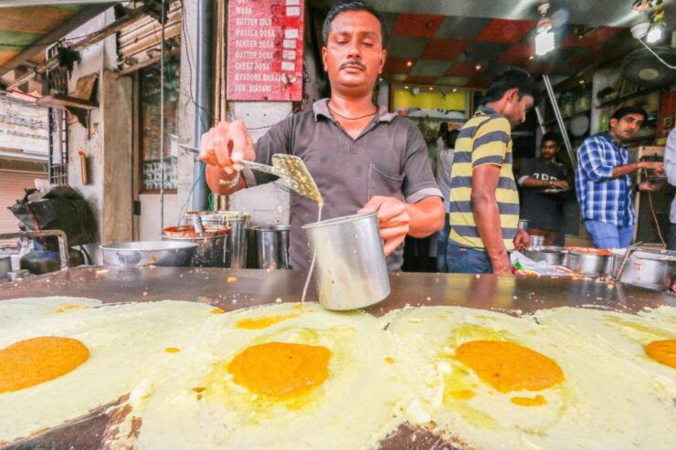 Kuala Lumpur: Evening Food Tour by Bike - Booking Details and Cancellation Policy