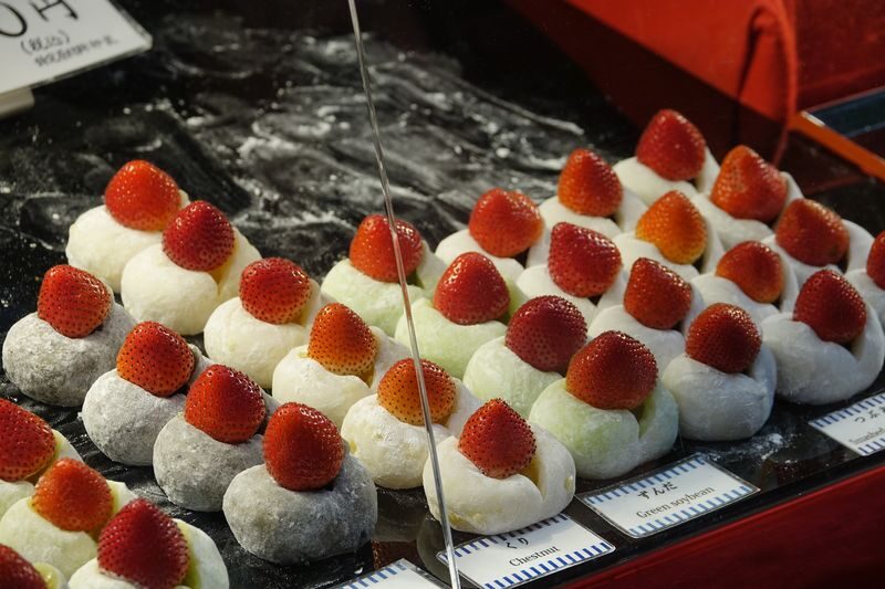 Kuromon Market & Dotonbori Food Tour with Wagyu in Osaka - Dotonbori: takoyaki, gyoza and a lively finish