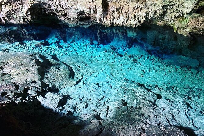 Kuza Cave, Paje Beach, The Rock Restaurant, Stone Town, Secret Garden Restaurant - Group Size and Pickup