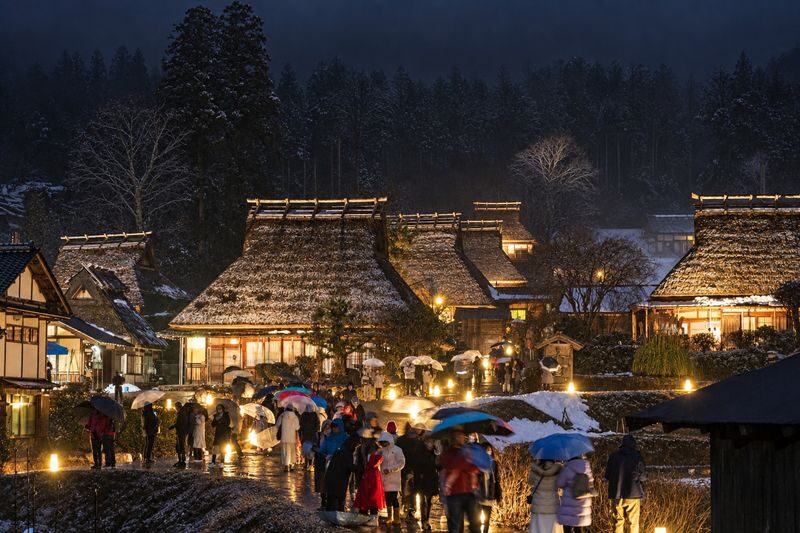 Kyoto Miyama Winter Lantern Festival Illumination & Amanohashidate & Ine Funaya Boat Tour One-Day Trip - Miyama after dark: lanterns, thatch and cold feet
