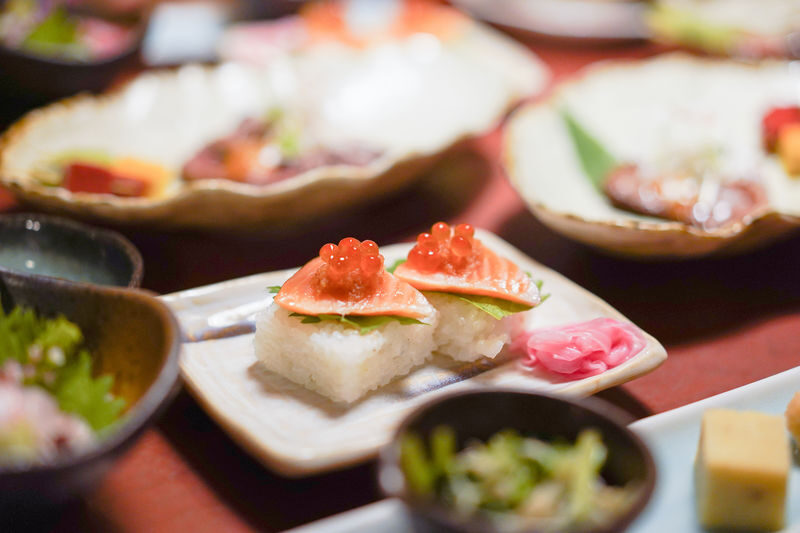 Kyoto Premium Night Foodie Tour in Gion(9+dishes + 3 Sake tastings) - Kawaramachi ends with sake and a standing bar
