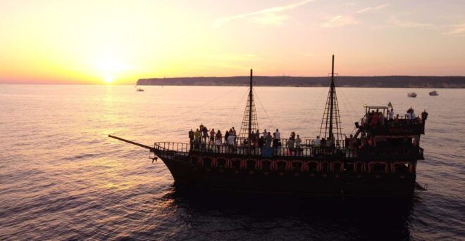 Lampedusa: Sunset Dolphin Sighting on a Pirate Ship - Includes