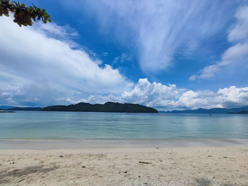 Langkawi Island Hopping Half-Day Cruise Experience - Beras Basah: swimming, lunch, and a reality check