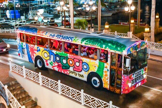 Latin Caribbean Sunset Party Bus tour with Karaoke - A Fun and Festive Night in Aruba: The Latin Caribbean Sunset Party Bus Tour with Karaoke