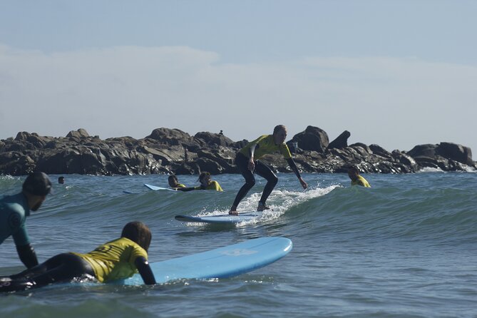 Learn to Surf Lesson With Transport From Porto - Transportation and Meeting Details