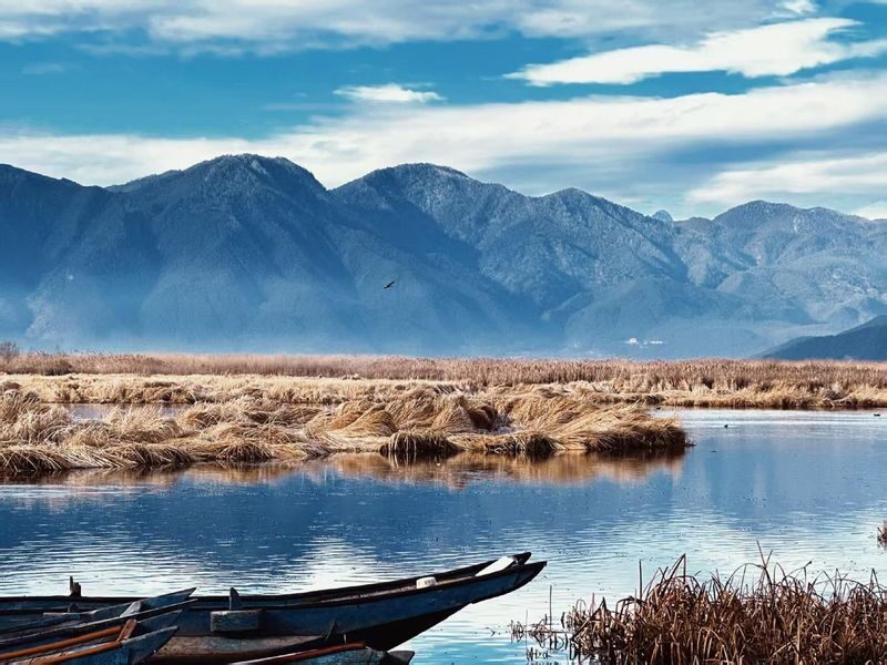Lijiang Lugu Lake Mosuo Culture One-Day Tour - Caohai and the Walking Marriage Bridge