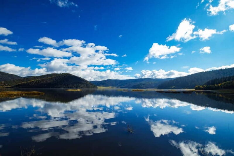 Lijiang: Pudacuo National Park and White Water Terrace Tour - An Introduction to Pudacuo National Park