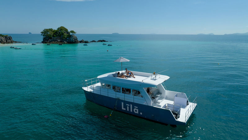 LILA Premium Catamaran Boat Tour Full Day Similan Late Departure - Island No. 8: Sail Rock, beach time, and lunch