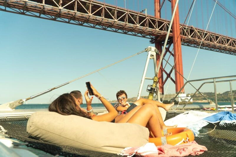 Lisbon: Catamaran Boat Party with Music, Open Bar & Dives - Good To Know  
