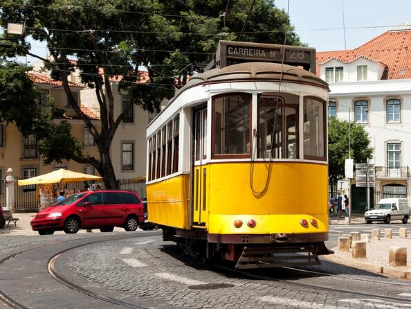 Lisbon Hills Red Tram by Tram 28 Route - The Sum Up