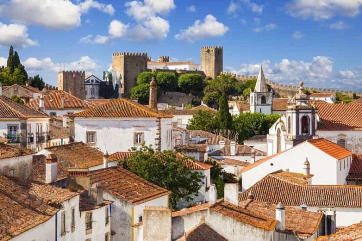 Lisbon-Porto Transfer Stopping in Óbidos, Nazaré, and Aveiro - Booking Information